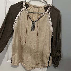 Altar’d state top. Tan with green sleeves.